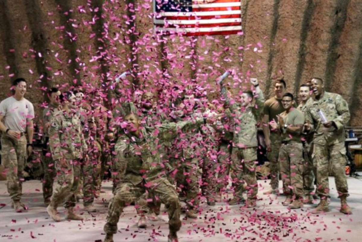 PHOTO: U.S. Army soldiers deployed in Afghanistan used pink confetti to reveal the gender of Brit and Chris Harris's baby.