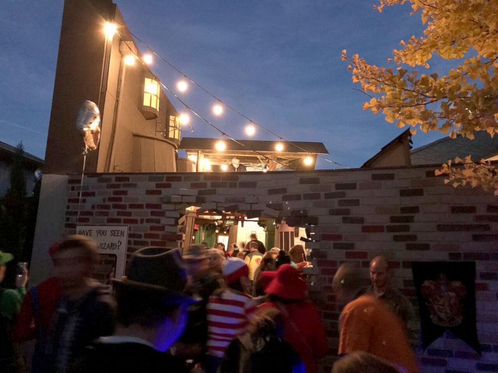 PHOTO: On Halloween night, hundreds of children and adults entered through a magic brick wall to see the spellbinding setup. 