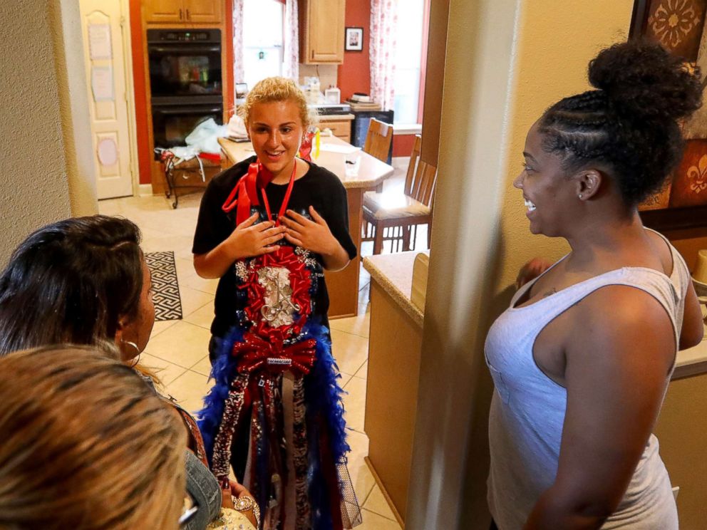 PHOTO: Ashley Reel of Spring, Texas, has collected over 2,000 evening dresses for high school students all over the Houston area who have been affected by Hurricane Harvey.