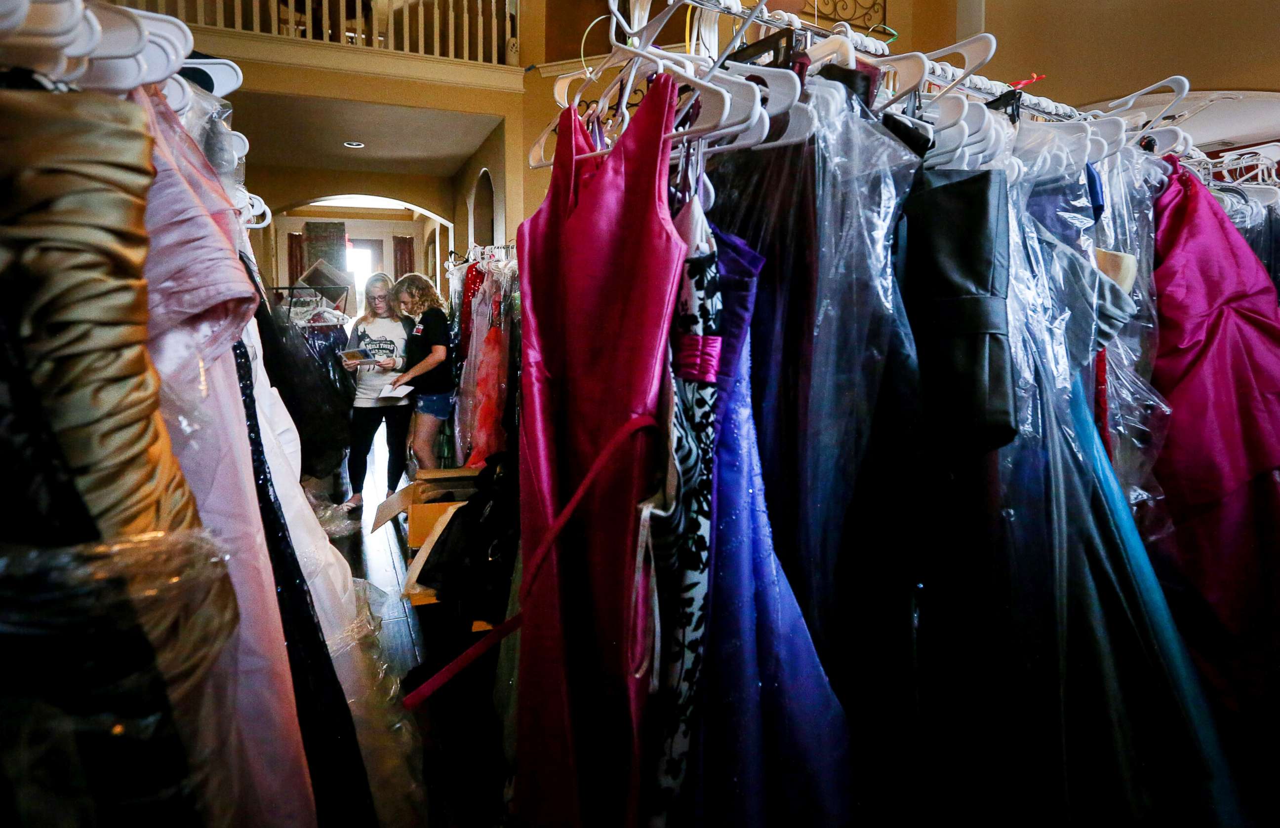PHOTO: Ashley Reel of Spring, Texas, has collected over 2,000 evening dresses for high school students all over the Houston area who have been affected by Hurricane Harvey. 