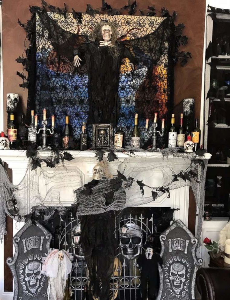 PHOTO:  Spooky decorations cover the Halloween-obsessed family's mantle.