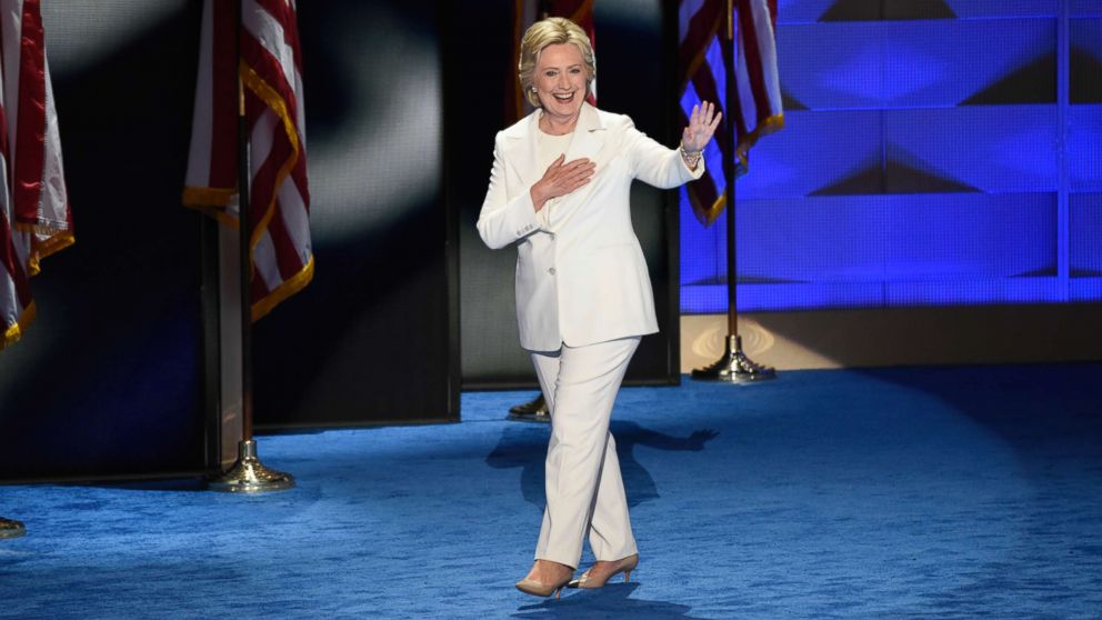 PHOTO: Hillary Clinton, wearing a white pantsuit, takes the stage to accept the Democratic nomination for president, July, 28, 2017 in Philadelphia. 