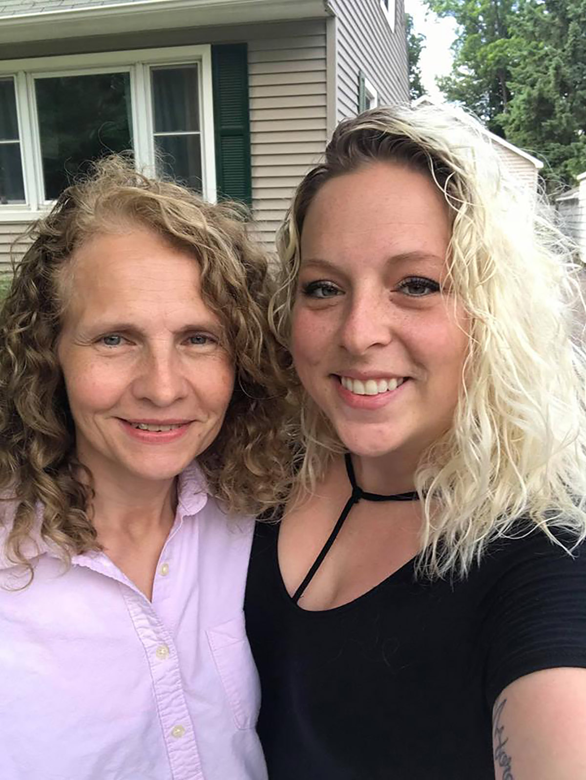 PHOTO: Hillary Harris, 31, poses with her long-lost sister, Dawn Johnson, 50, after they learned they lived next door to one another in Wisconsin.