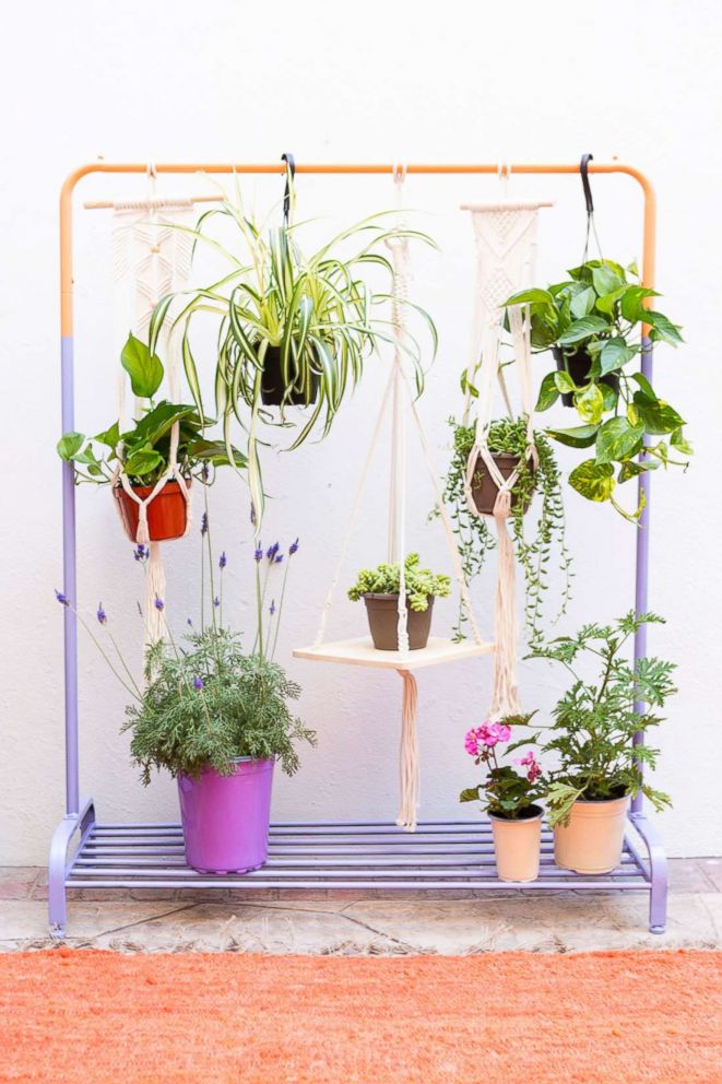 PHOTO: Learn step-by-step from Brit + Co how to make a bar out of cinder blocks and a clothing rack planter.