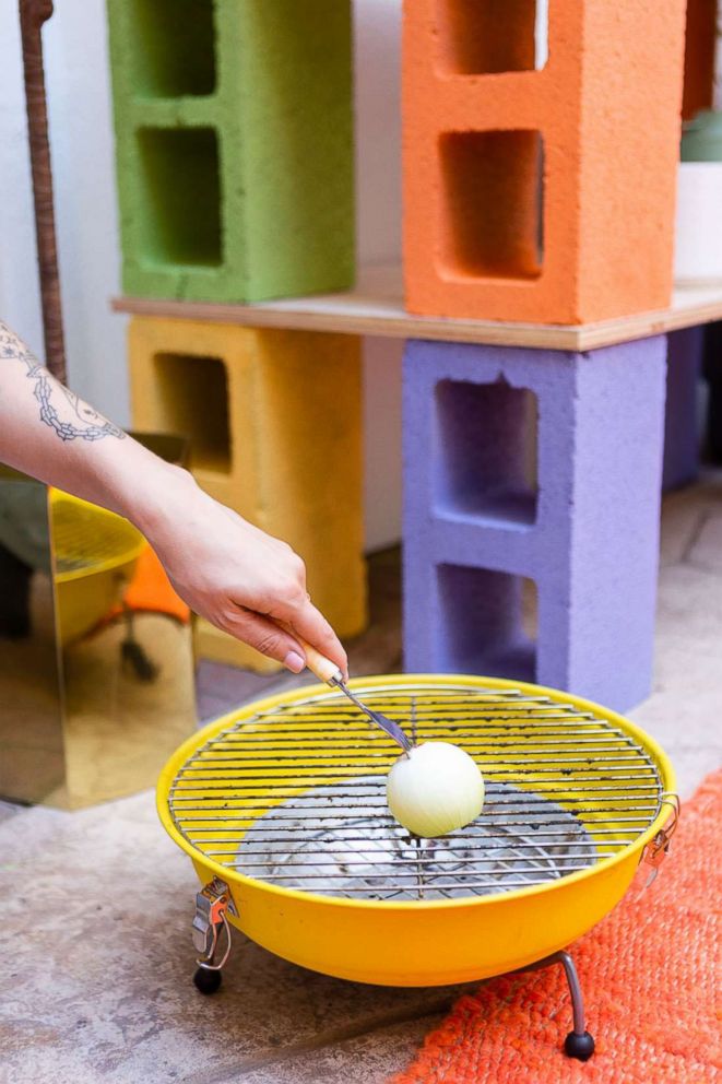 PHOTO: Learn step-by-step from Brit + Co how to make a bar out of cinder blocks and a clothing rack planter.