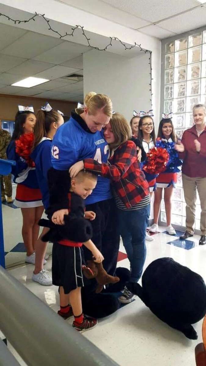 PHOTO: Sgt. Lacey Poltoratskiy surprised her 7th grade daughter, JaiceyBelle Hunter, and kindergartner son, Daxton Hunter at their schools on Monday.