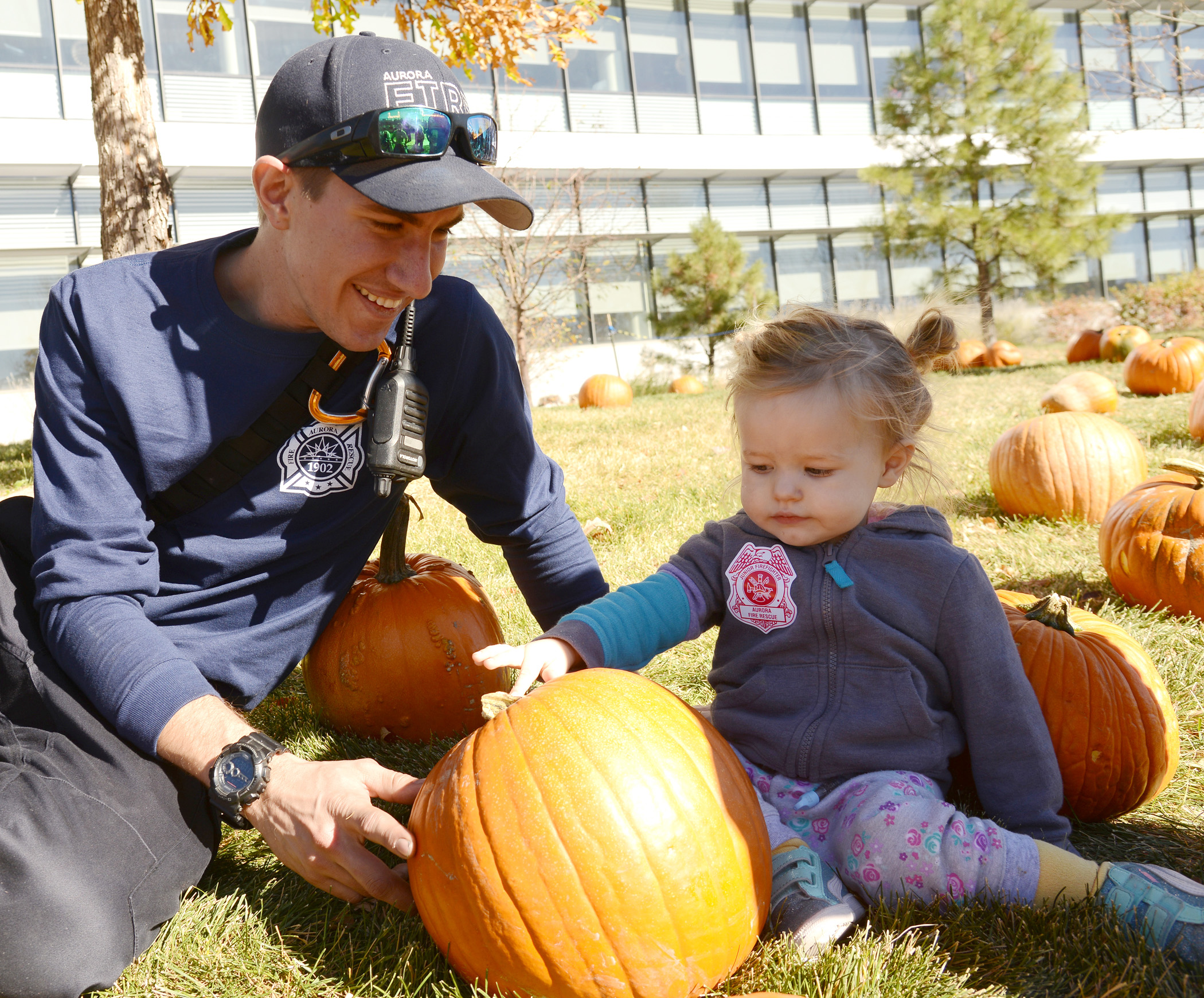 PHOTO: Two-year-old Ivy Page hunts for a pumpkin outside Children's Hospital Colorado in Aurora, where she is being treated for neuroblastoma, Oct. 25, 2017.