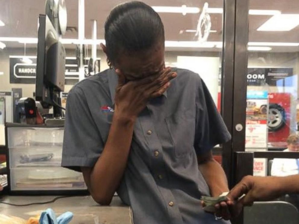 PHOTO:Firestone employee Tia Benbow was surprised with $1,300 from her boss and coworkers to help keep her long-distance job in Columbia, South Carolina.