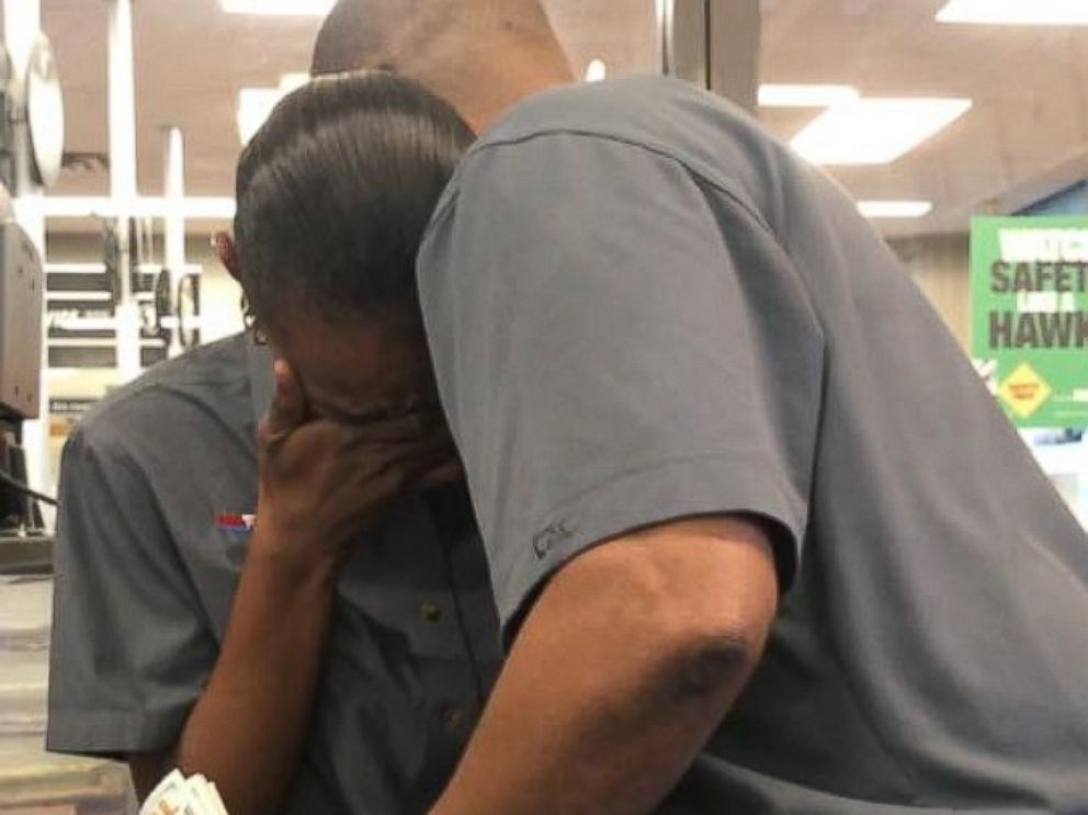 PHOTO:Firestone employee Tia Benbow was surprised with $1,300 from her boss and coworkers to help keep her long-distance job in Columbia, South Carolina.