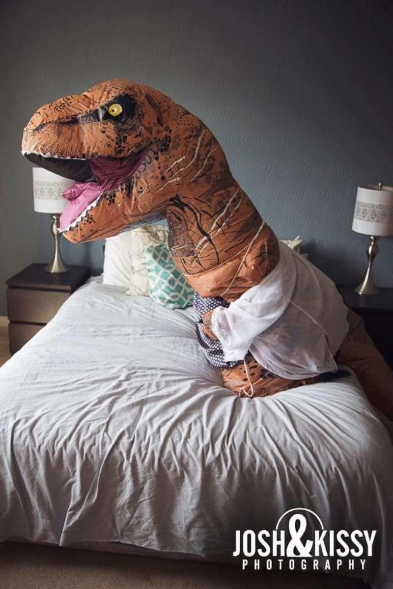 PHOTO: Nicole Stein gifted her now husband Chris Hall a boudoir photo shoot featuring pictures of her dressed in a T. Rex costume on their July 1 wedding.