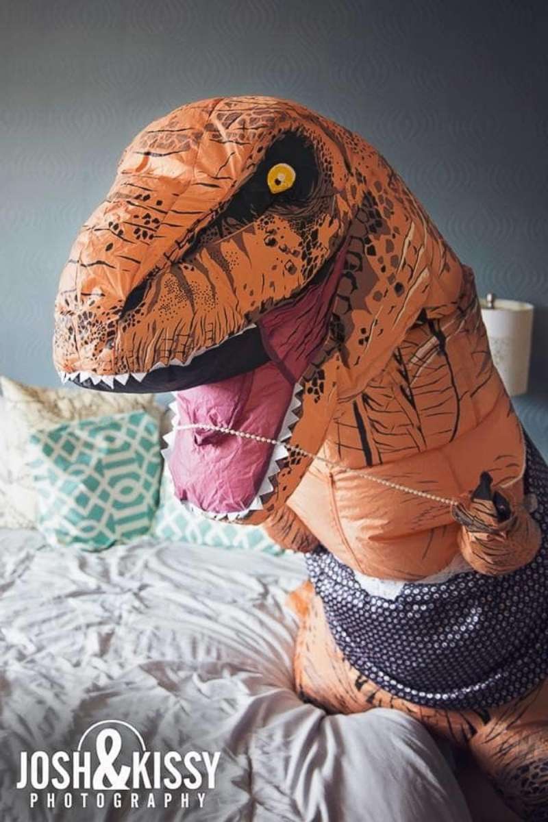 PHOTO: Nicole Stein gifted her now husband Chris Hall a boudoir photo shoot featuring pictures of her dressed in a T. Rex costume on their July 1 wedding.