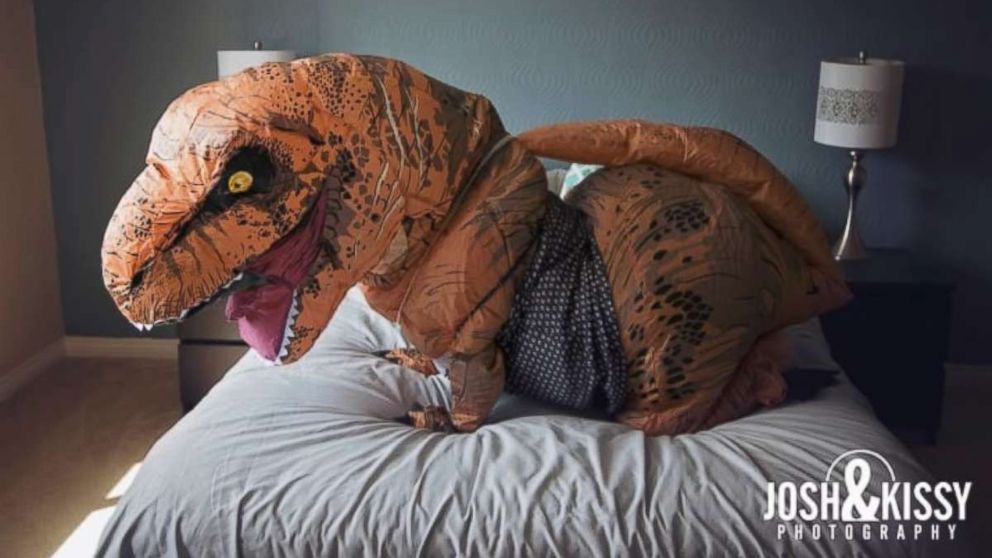 Nicole Stein gifted her now husband Chris Hall a boudoir photo shoot featuring pictures of her dressed in a T. Rex costume on their July 1 wedding.