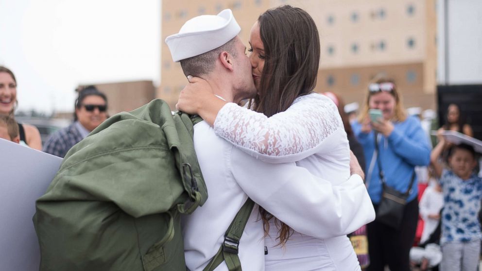 PHOTO: Natasha Daugherty surprised her husband Chris with her pregnancy when he arrived home from deployment on June 23, 2017.