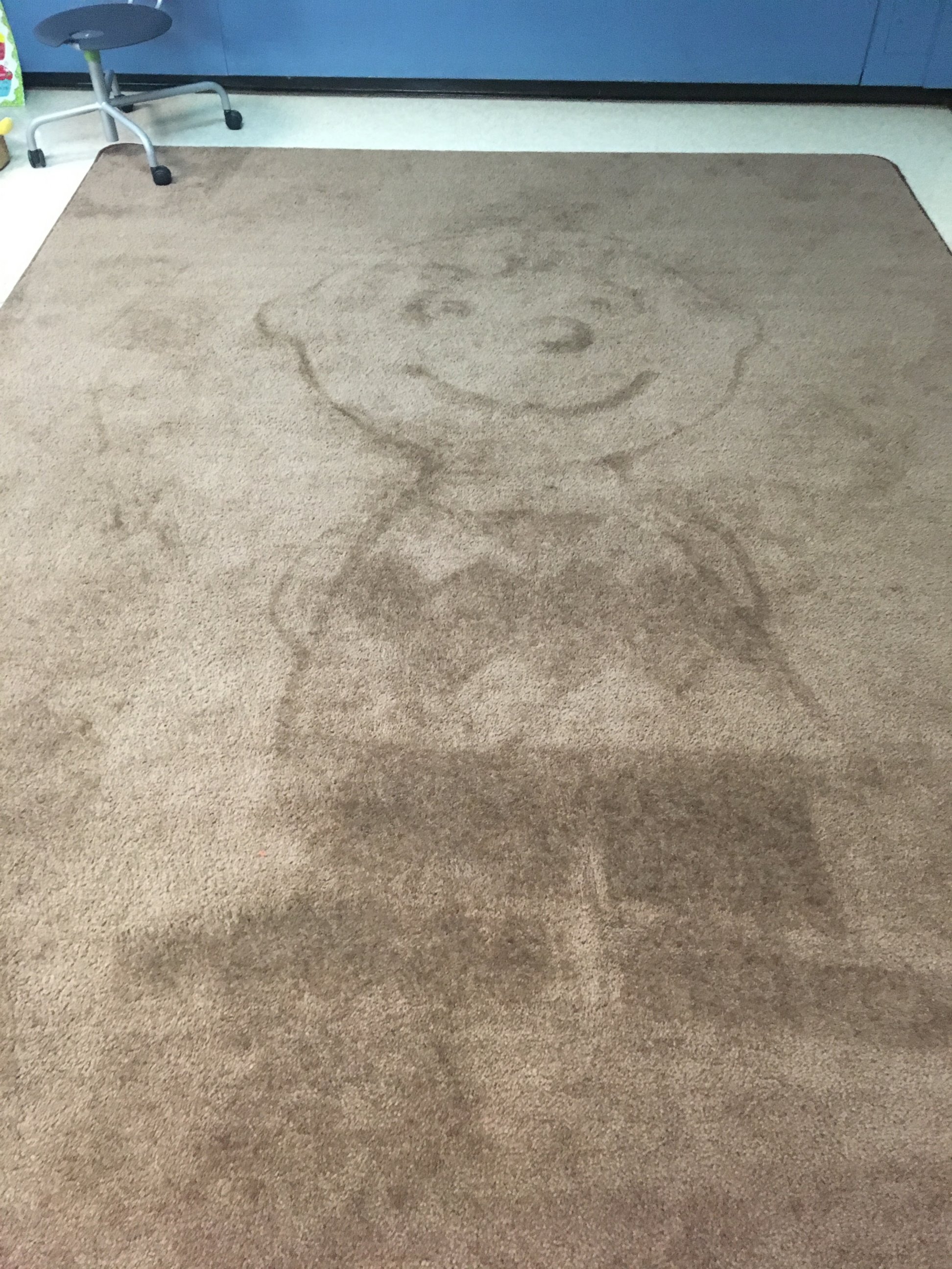 PHOTO: School janitor Ron Munsey vacuums artistic designs into classroom rugs as daily surprise for kids.
