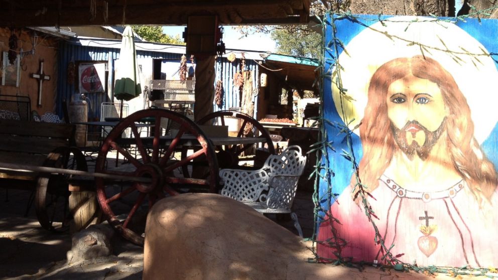 Jesus painting in a shed.