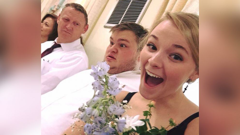 Ashley Stevens, right, taking a selfie with her father, left and boyfriend Christopher Reed, middle.