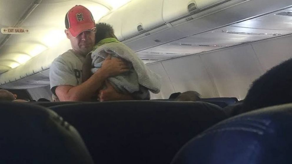VIDEO: Kind Stranger Puts Fellow Passenger's Baby to Sleep Midflight