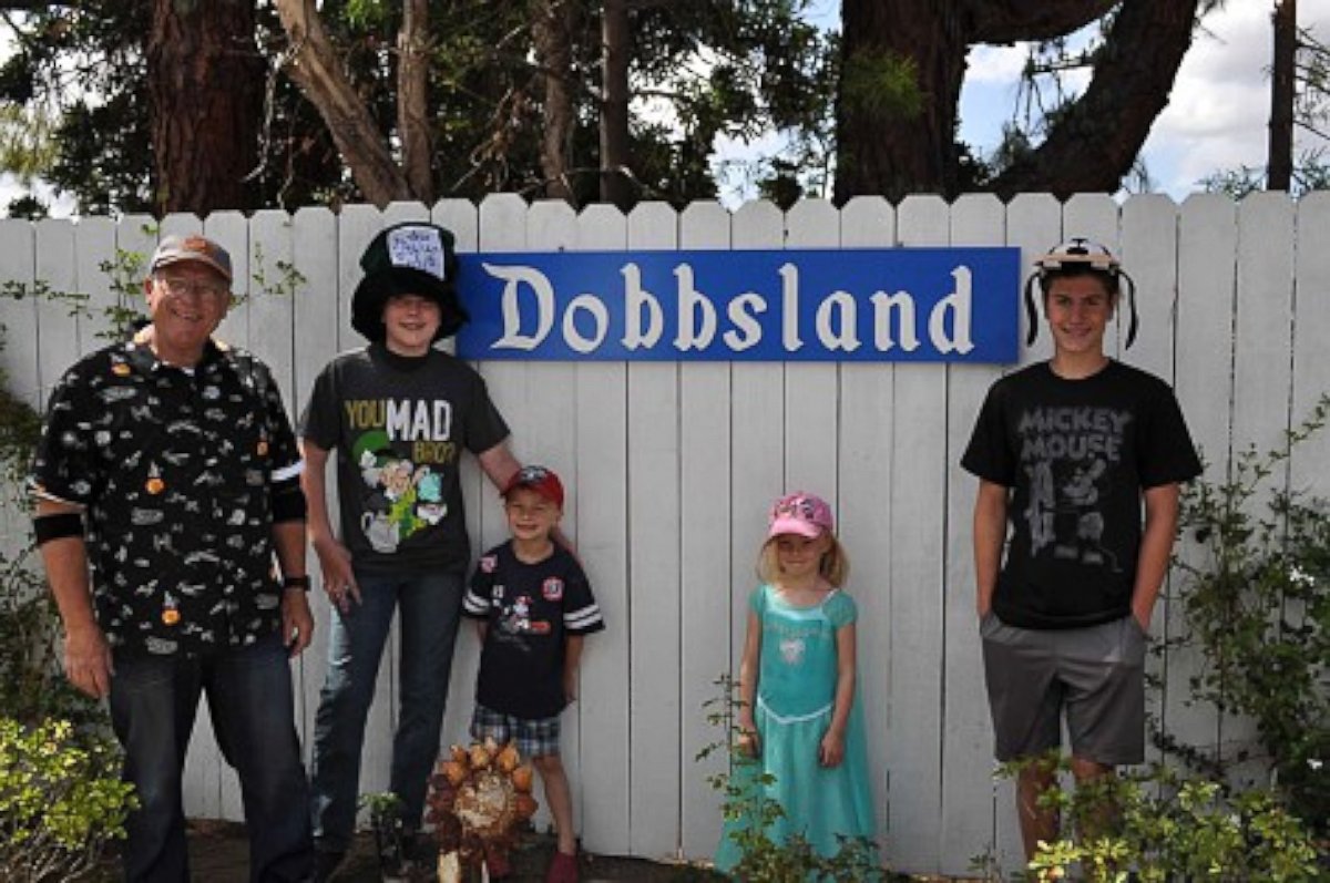 PHOTO: Grandpa Builds Disneyland-Inspired Backyard Theme Park for His Grandkids