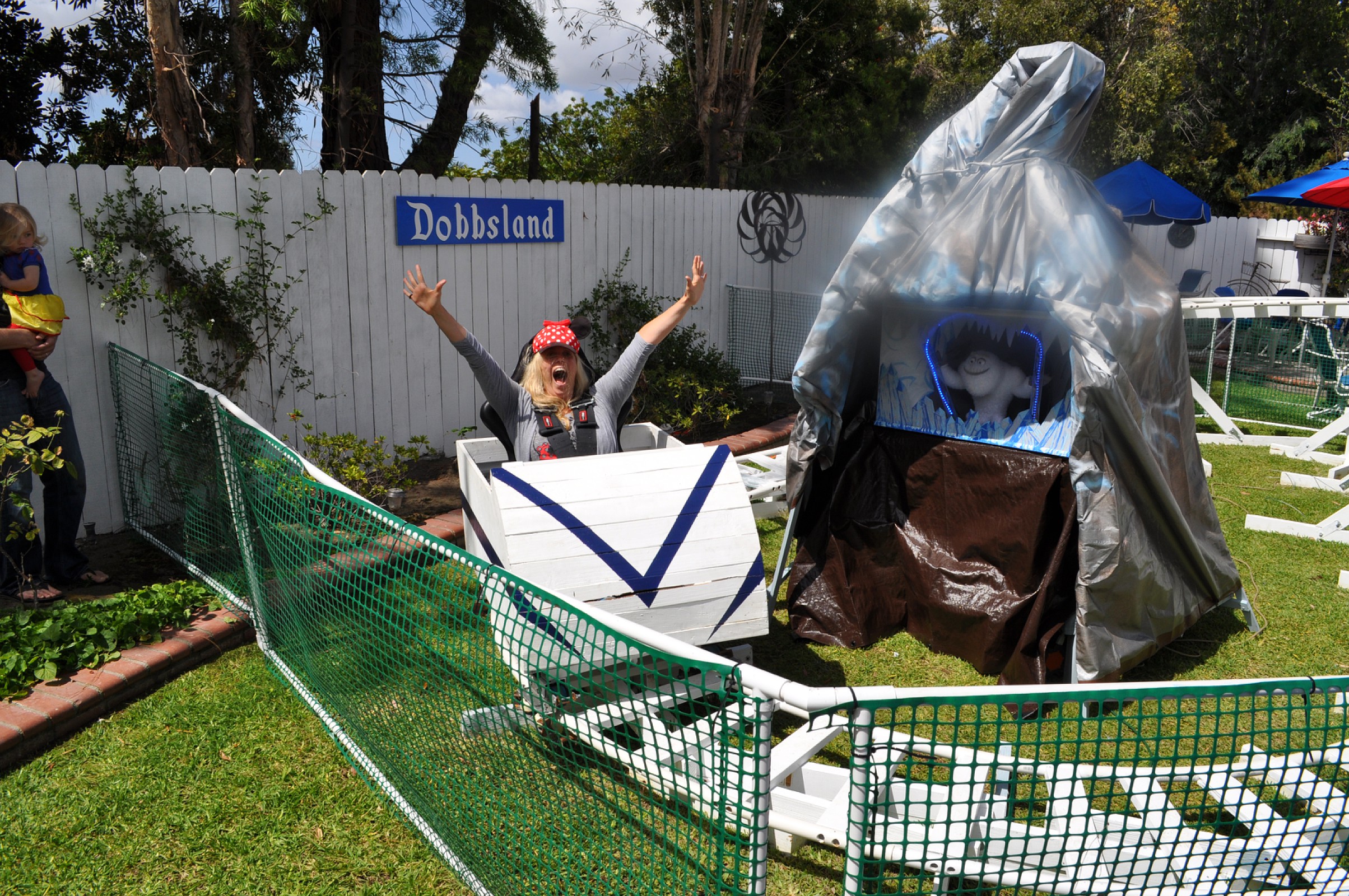 PHOTO: Grandpa Builds Disneyland-Inspired Backyard Theme Park for His Grandkids