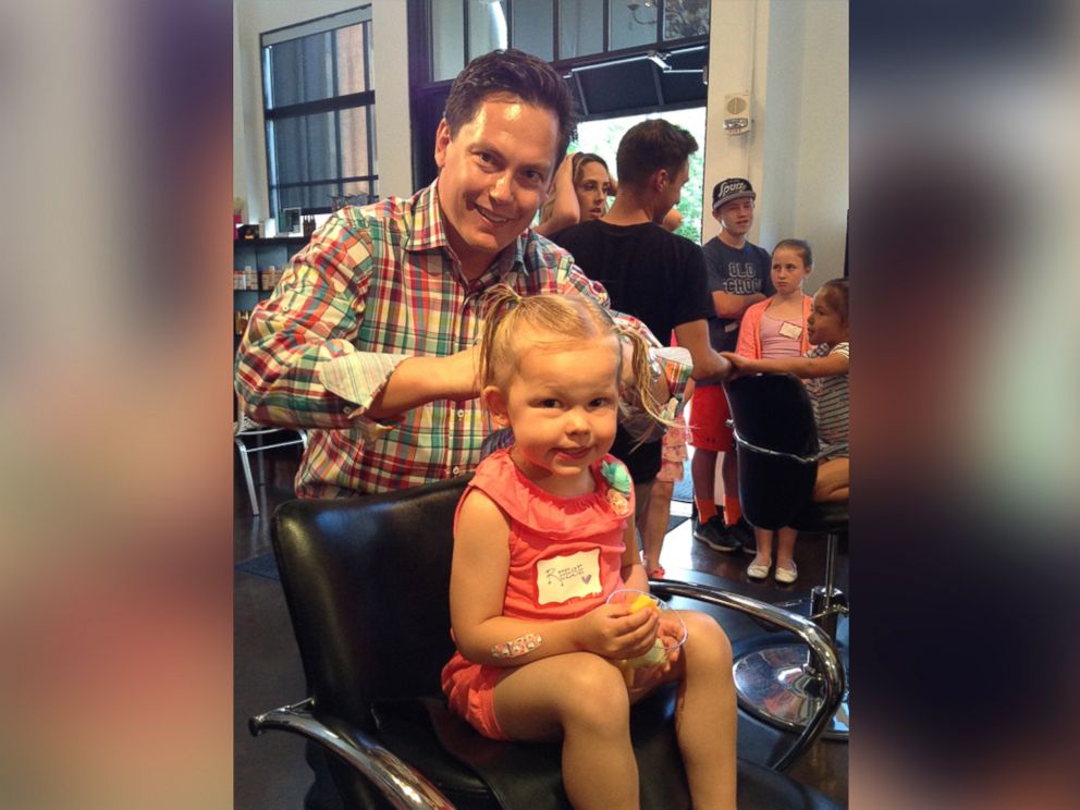 PHOTO: Envogue Salon in Denver is the site of a "beer and braids" class for dads to learn about styling little girls' hair. 