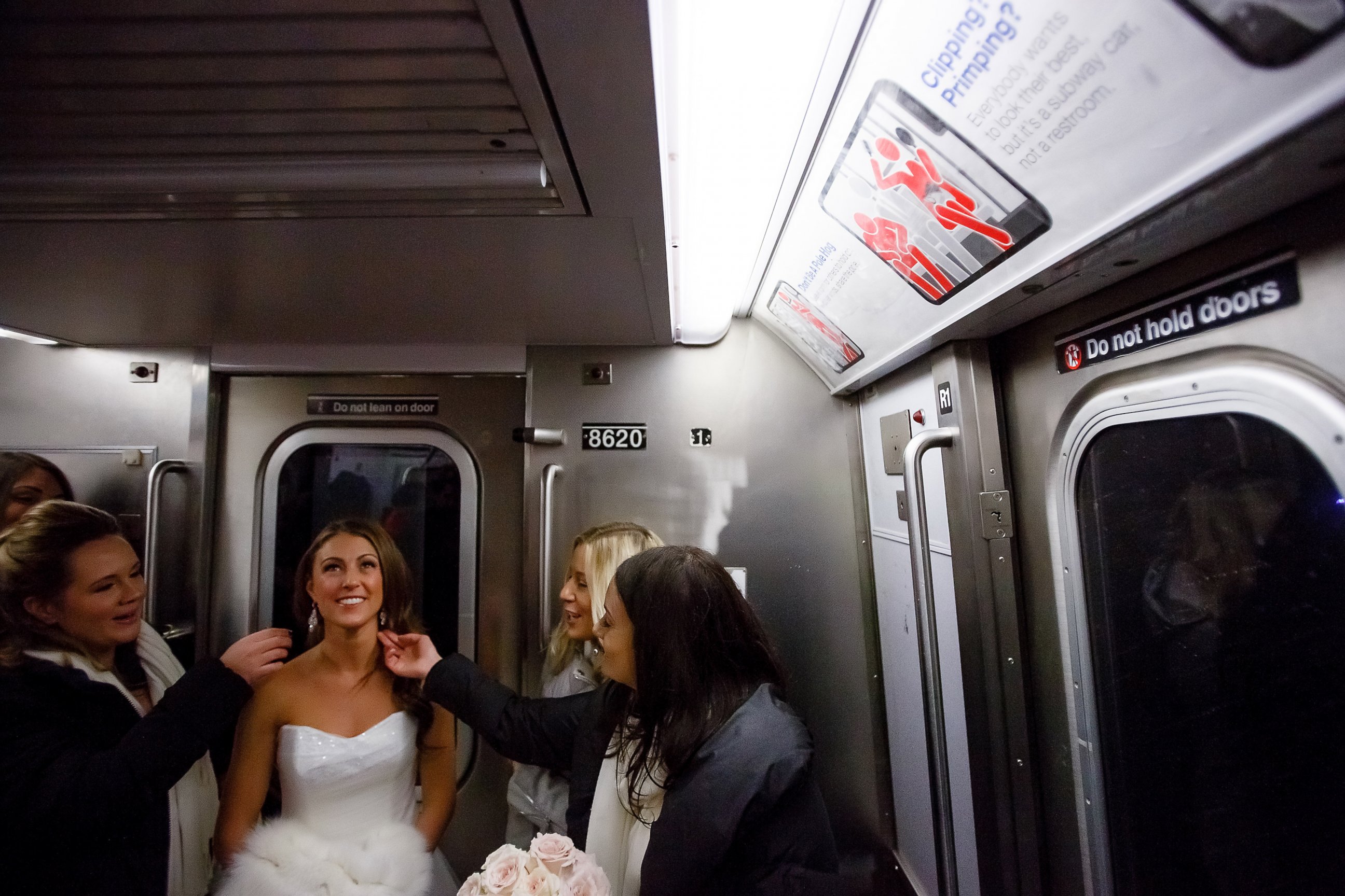 PHOTO: When a travel ban was put in place due to the inclement weather on Jan. 23, 2016, bride Ashley Burlage and her wedding party took the subway to the ceremony. 