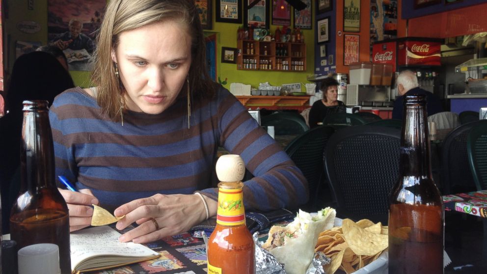 PHOTO: FiveThirtyEight burrito correspondent Anna Barry-Jester hard at work choosing our country's best version.