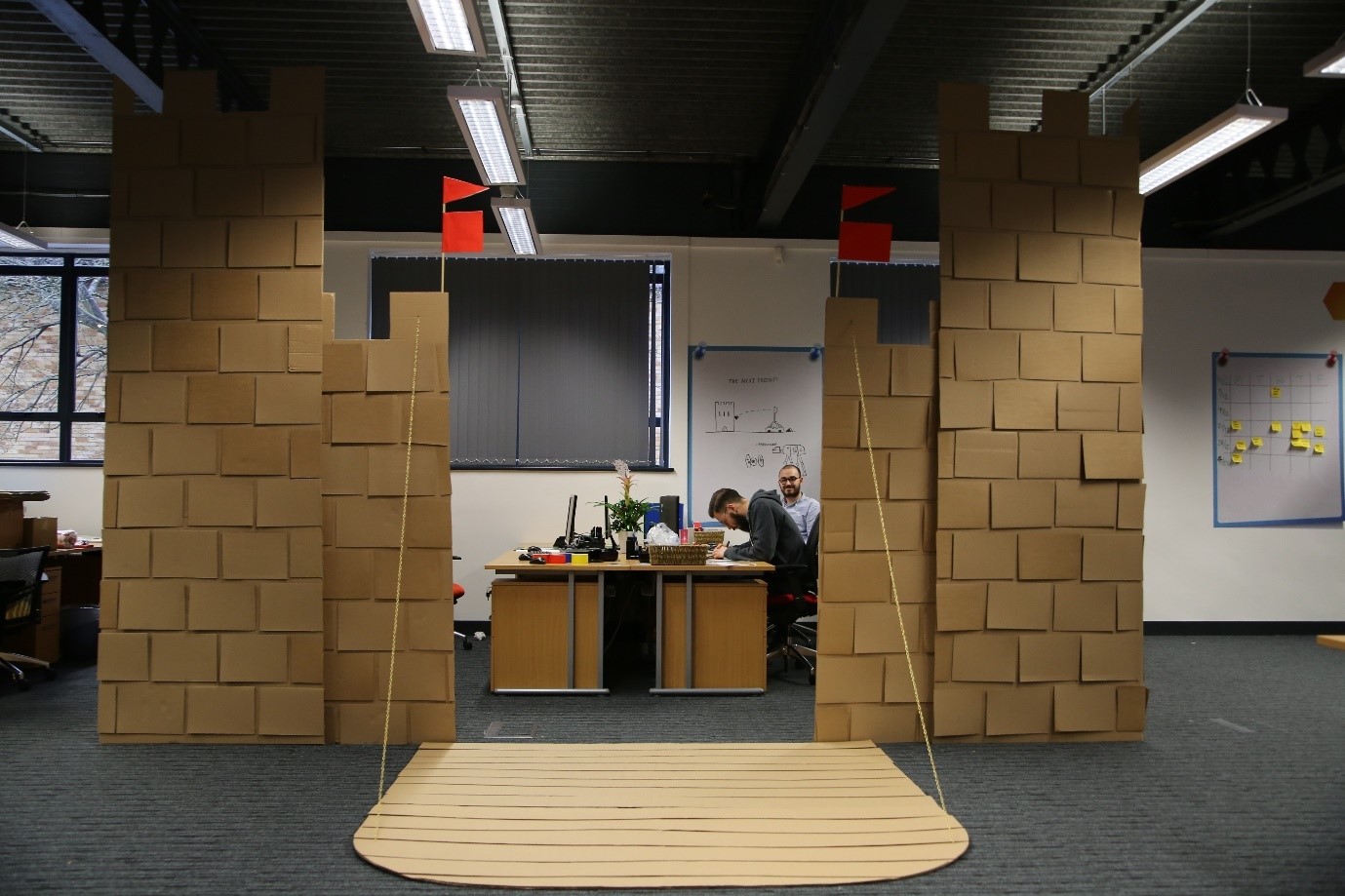 PHOTO: Coworkers Built a 10-Foot-Tall Cardboard Castle in Office