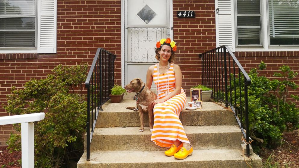 Christina Summers posing in front of her grandmother's home, which she is giving away in a recipe contest.
