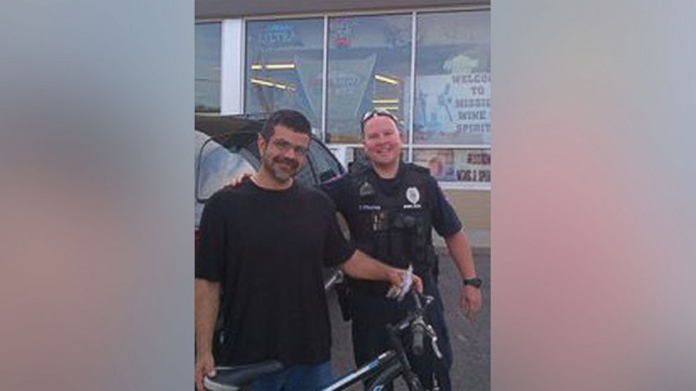 PHOTO: A Roeland Park, Kansas, police officer's good deed is going viral after he gave a homeless man a bike to commute to work.