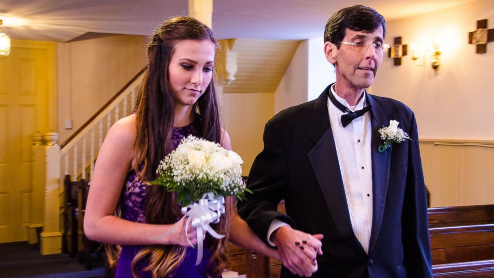 Ken McHugh, 47, fulfilled his dying wish to walk his four children down the aisle on October 3.