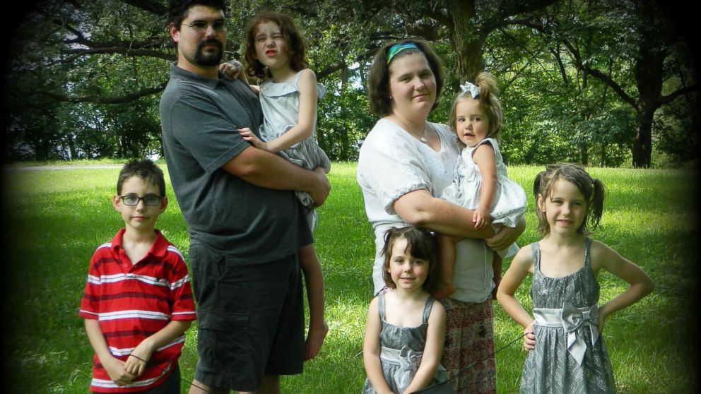 PHOTO:Whitney Walters photographed with her husband and five children.