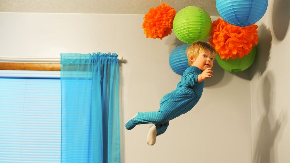 Wil Lawrence is a 18-month-old toddler with Down syndrome. He is the subject of a photo series his dad, Alan Lawrence, created. Lawrence says Wil will be able to do anything he wants in life, even "fly."
