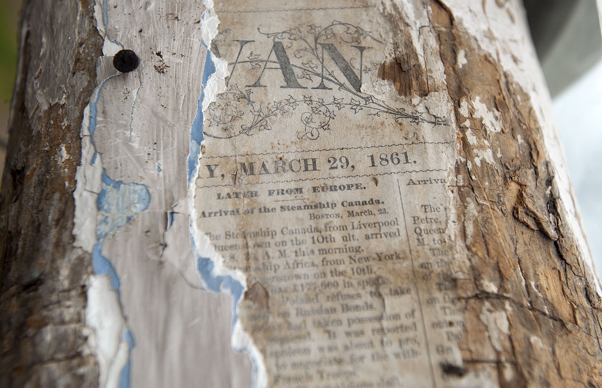 PHOTO: A newspaper dating back to 1861 was found on one of the beams of a historic log cabin along Route 68 in Lisbon that was in the process of being moved to the St. Lawrence Power & Equipment museum in Madrid. 