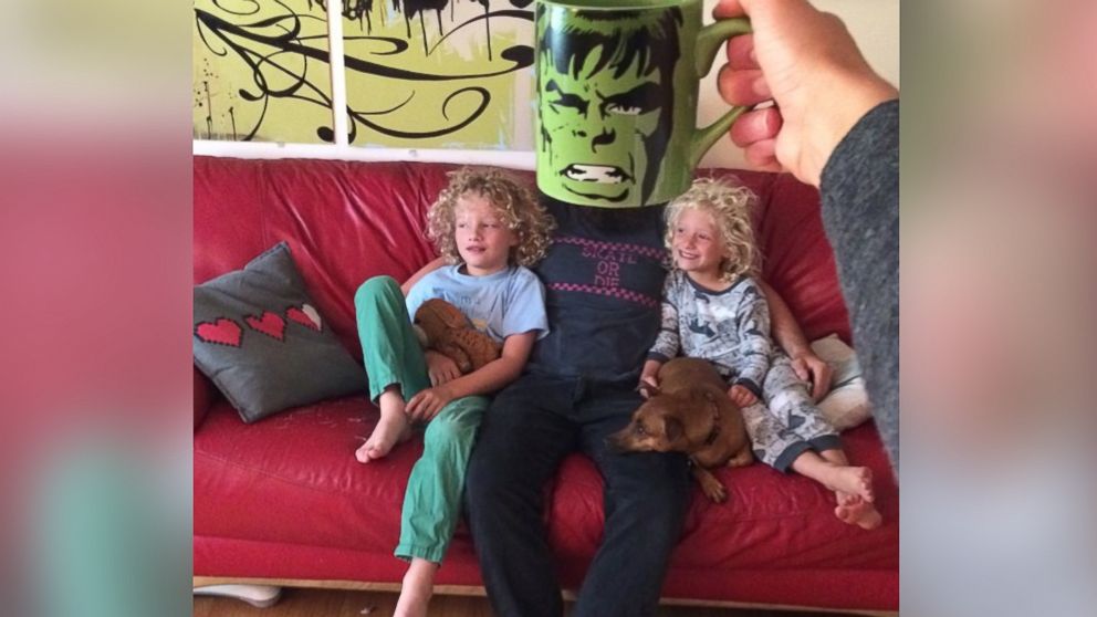 Lance Curran creates superhero "mugshots" of his kids using comic book character coffee mugs.