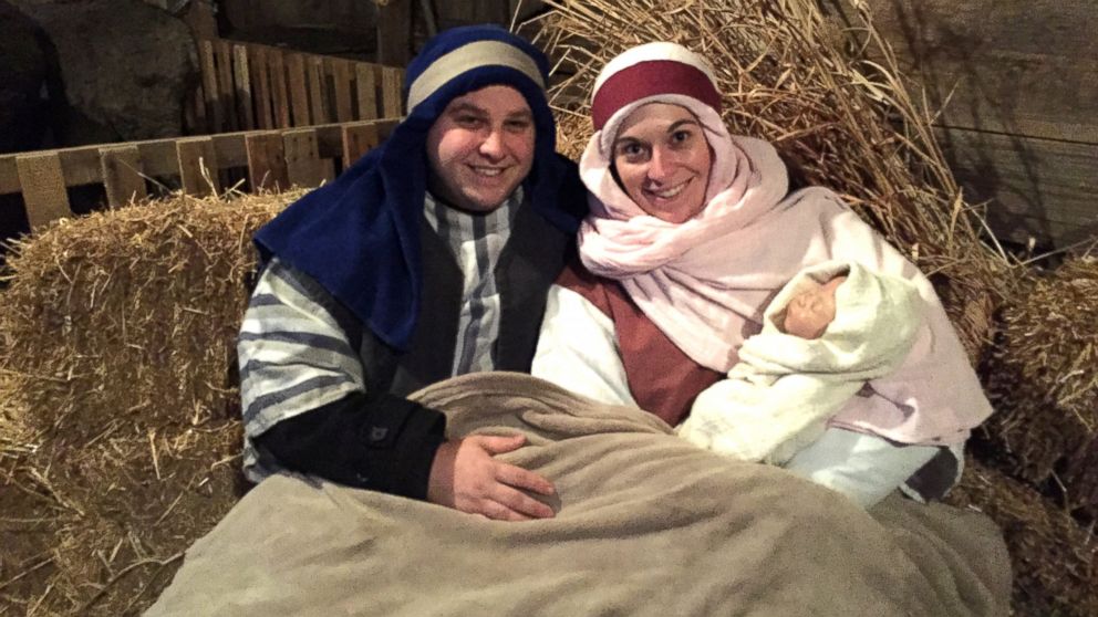 Joe Maurer, dressed as Joseph, proposed to Kate Heinlein, dressed as Mary, during a church's Living Nativity event.