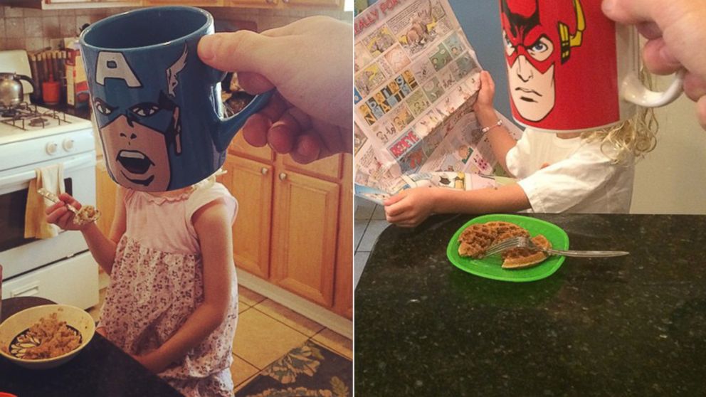 PHOTO: Lance Curran creates superhero "mugshots" of his kids using comic book character coffee mugs.