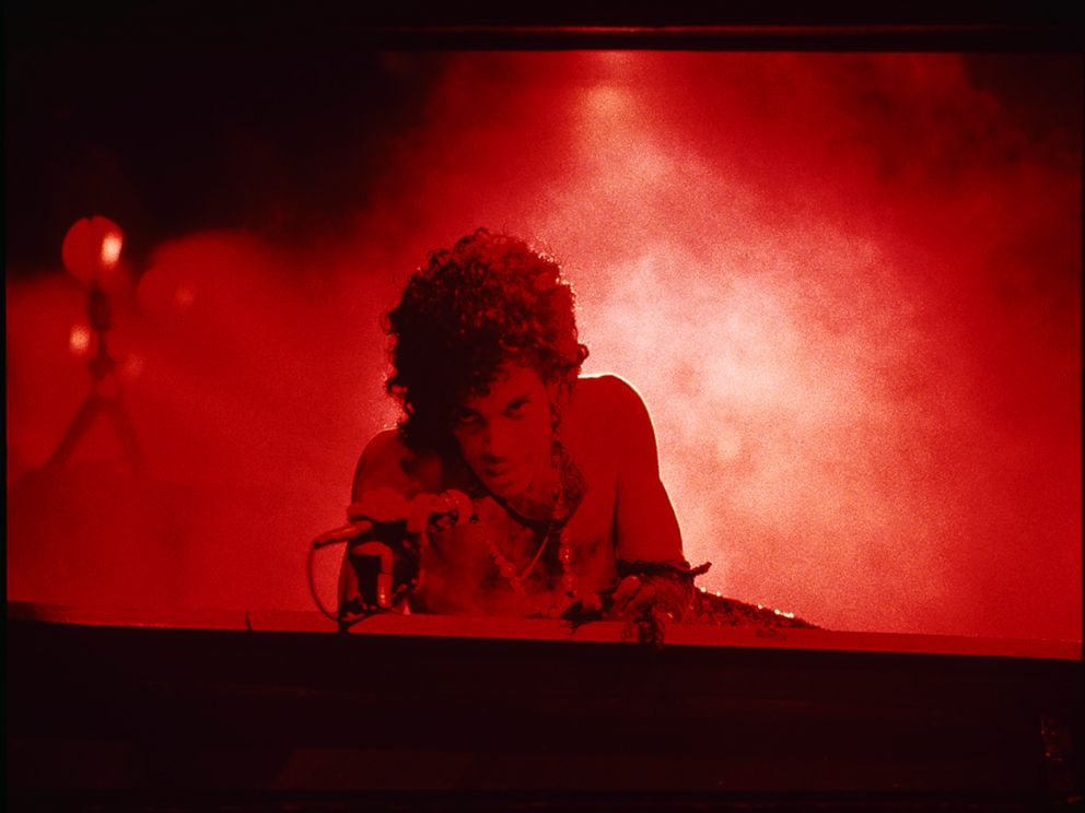 PHOTO: Prince performs onstage during his Purple Rain Tour. 