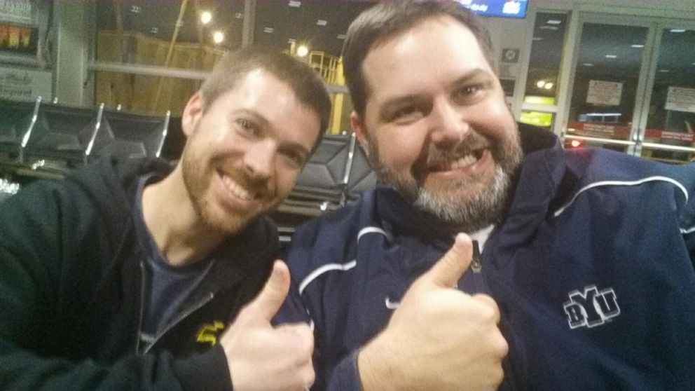 PHOTO: Government workers Matt Brown and Lance Magnusson share smiles in make-up selfie. 