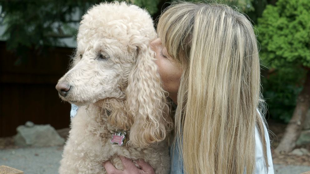PHOTO: Jan is pictured with her dog, "Marie." 