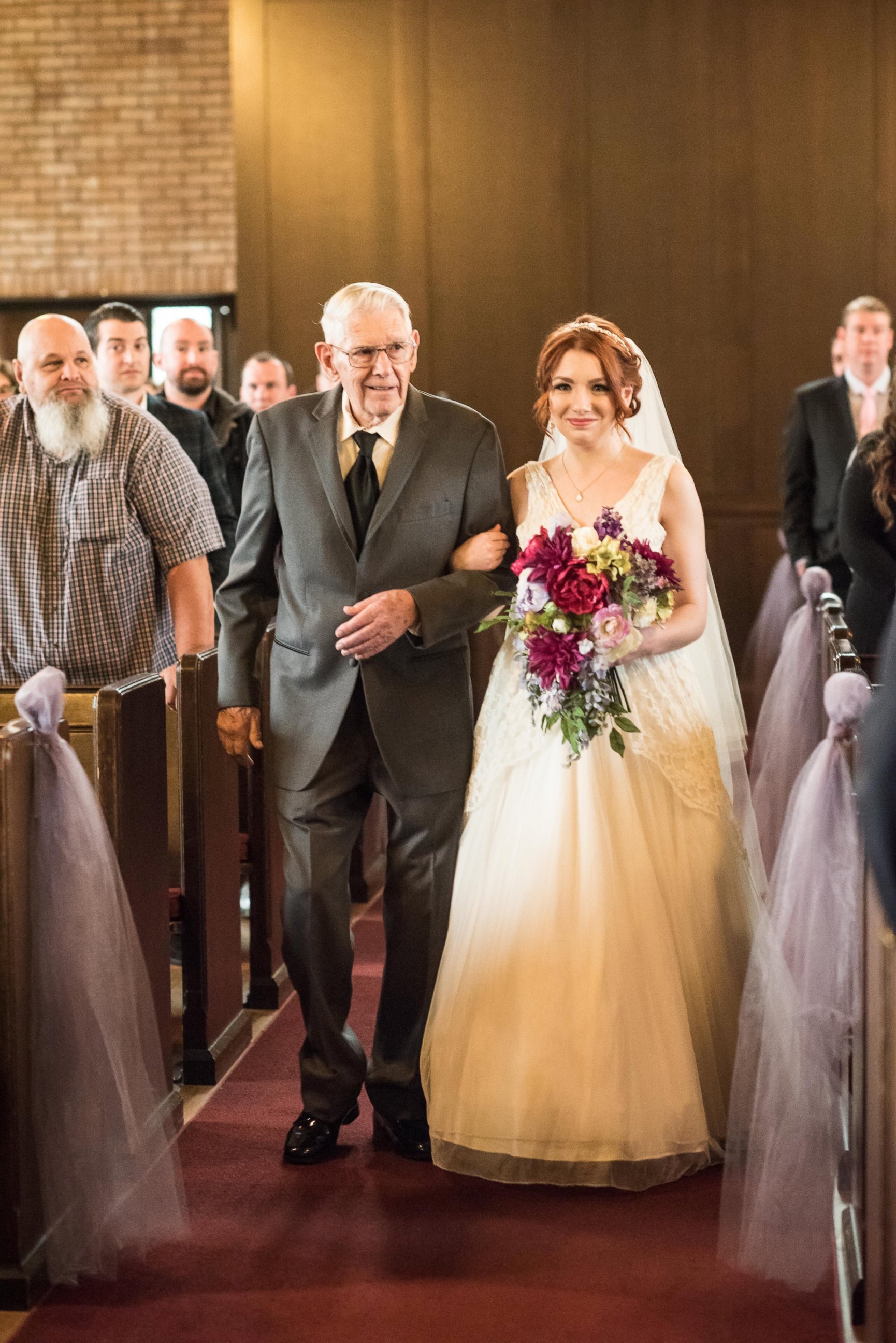 PHOTO: Grandfather Walks 3 Generations of Women Down the Aisle in Same Dress