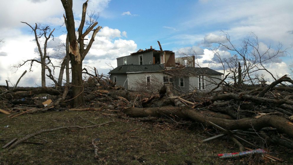 PHOTO: Jill Stawicki, 55, says a series of tornadoes ripped off the roof from the back of her and her husband's home in East Moline, Illinois, on March 15, 2016. 