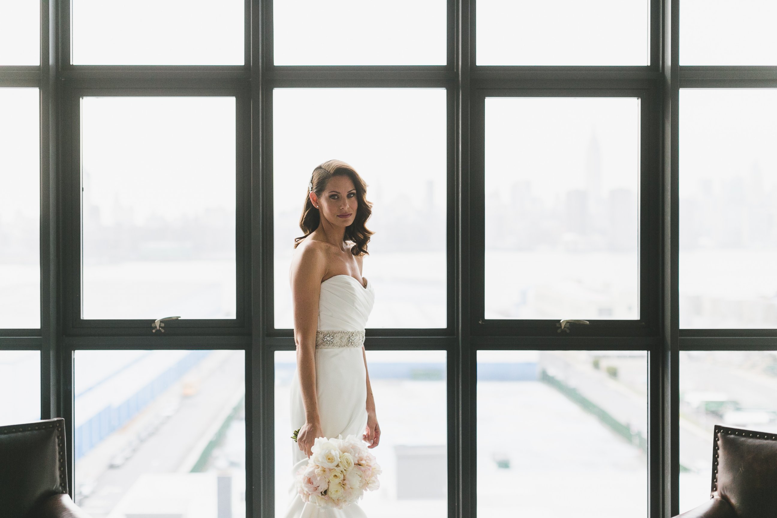 PHOTO: Jamie Cicero stands inside of the Wythe Hotel hours before her wedding ceremony in Brooklyn.