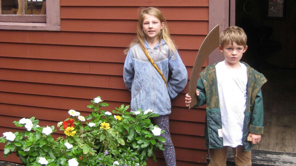 PHOTO: Uma Hyson, 8, and Charlo Hyson, 6, pose together at a historic landmark in Arlington, Mass.