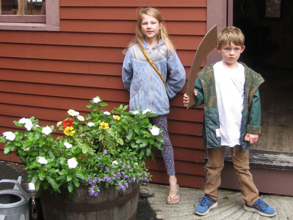 PHOTO: Uma Hyson, 8, and Charlo Hyson, 6, pose together at a historic landmark in Arlington, Mass.