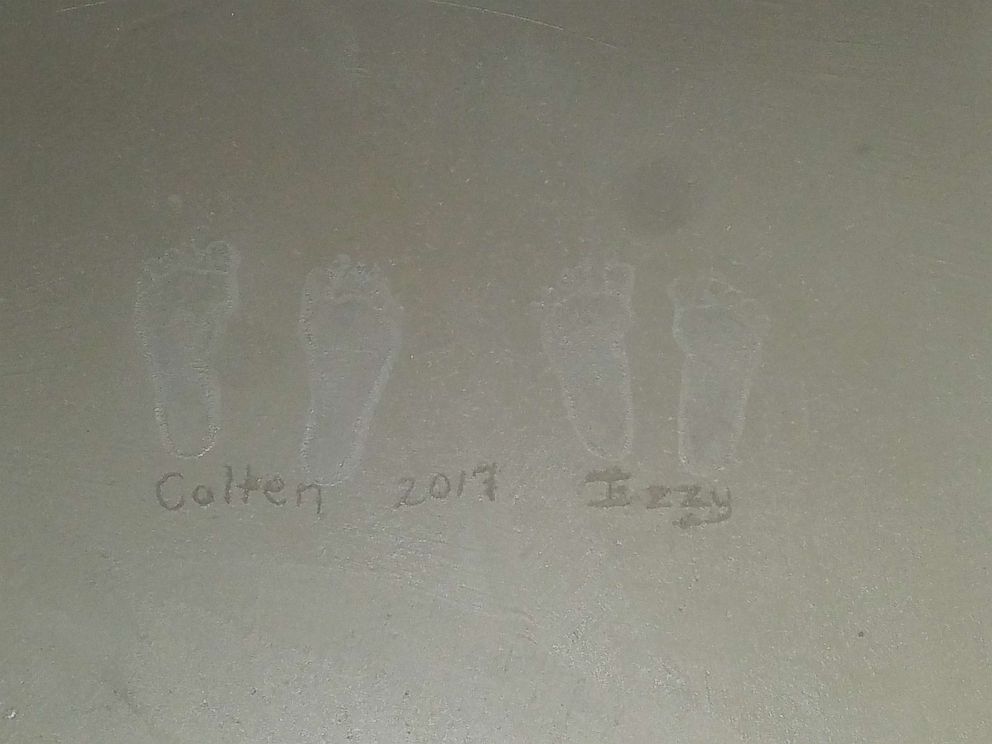 PHOTO: The footprints of Izzadora Millaway and her brother, Colten, are preserved in the basement of the family's Tennessee home.