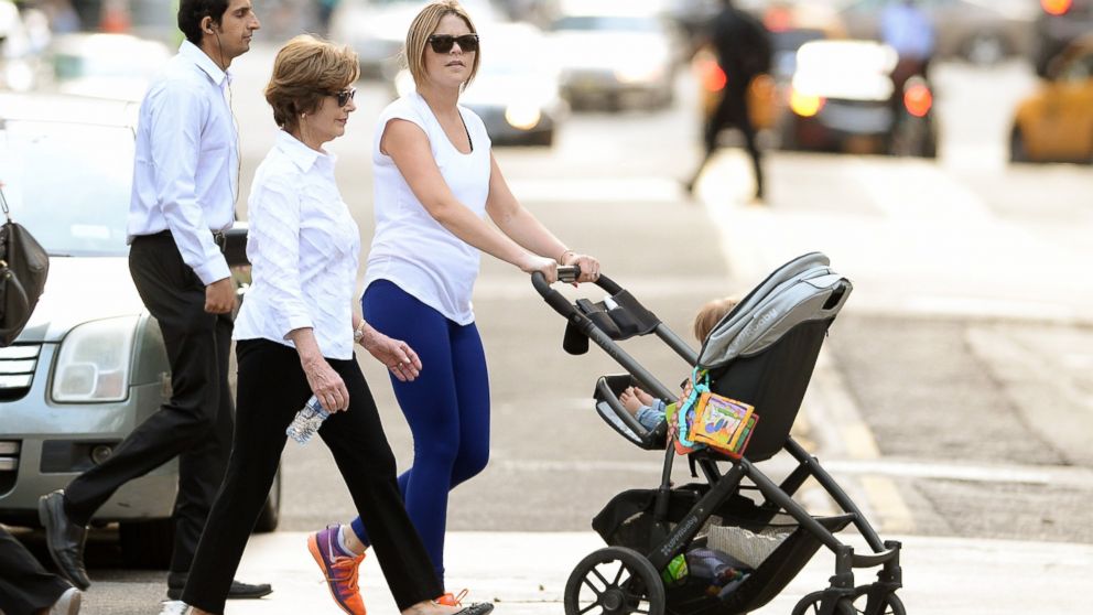 Jenna Bush Hager takes a walk along the Hudson River in New York City with mom Laura Bush and her baby daughter, Margaret Hager on May 20, 2014.