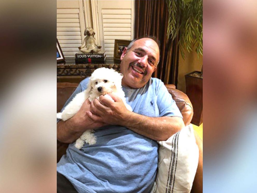 PHOTO: James Xuereb of Ontario was overcome with emotion when his family surprised him with a new bichon frise puppy after he recently lost two of his beloved dogs.