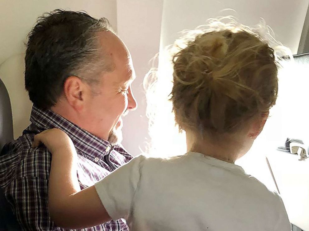 PHOTO: Jessica Rudeen, 34, of Bentonville, Arkansas, was flying with her daughter Caroline, 3, and her son Alexander, 4 months, from Kansas City, Missouri, when Todd Walker, 52, stepped in to lend a hand.