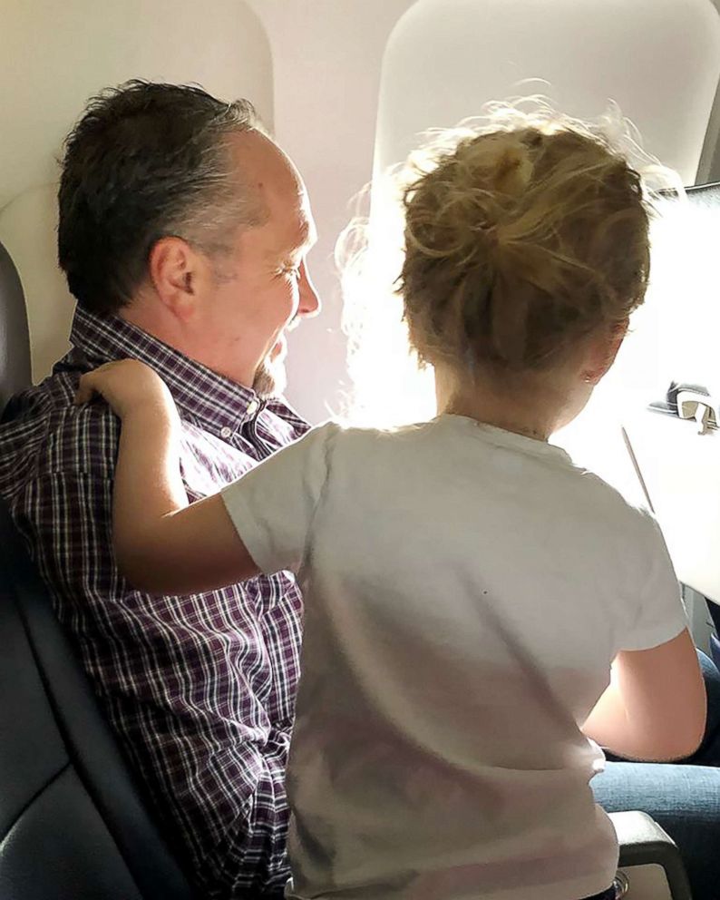 PHOTO: Jessica Rudeen, 34, of Bentonville, Arkansas, was flying with her daughter Caroline, 3, and her son Alexander, 4 months, from Kansas City, Missouri, when Todd Walker, 52, stepped in to lend a hand.