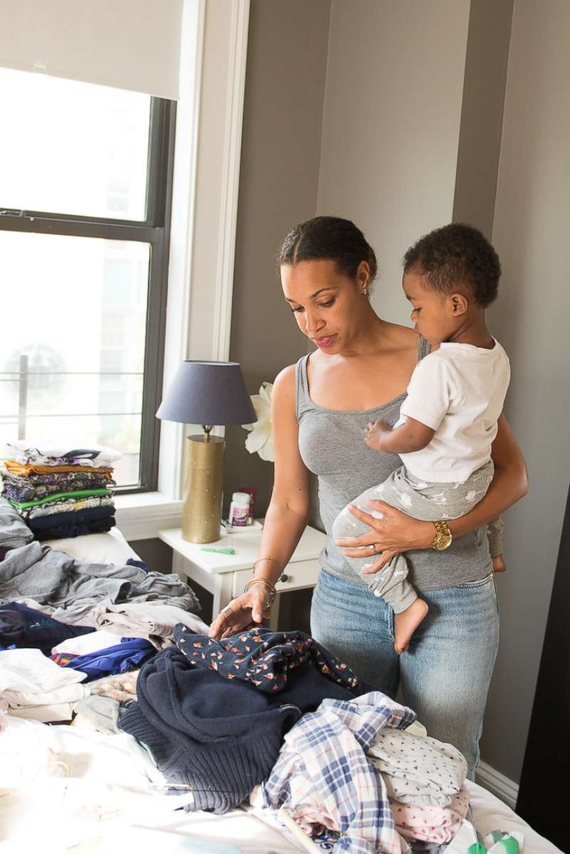 PHOTO: Jessica Rice with her 2-year-old son Jameson stripping her closet down to just 38 items.